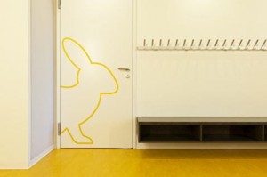 Modern public school rabbit print-out on white door